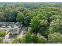 Lush aerial view of a neighborhood featuring tree-lined streets and well-maintained residences at 428 Sycamore Dr, Decatur, GA 30030