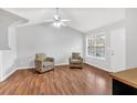 Bright living room with vaulted ceilings, ceiling fan and natural light at 182 Noah Dr, Rockmart, GA 30153