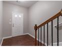 Bright foyer features hardwood floors, white trim, and a staircase at 2890 Ridgeview Sw Dr, Atlanta, GA 30331