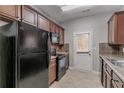 Functional kitchen with dark wood cabinets and appliances at 2890 Ridgeview Sw Dr, Atlanta, GA 30331