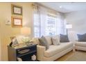 Comfortable living room with a neutral palette, soft lighting, and stylish decor, ideal for entertaining at 4033 Louise St, Powder Springs, GA 30127