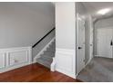 Entryway with staircase, fresh paint and hardwood floors at 11338 Musette Cir, Alpharetta, GA 30009