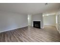 Bright living room featuring a fireplace and beautiful laminate flooring at 104 Westland Sw Ct, Marietta, GA 30064