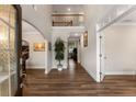 The foyer of the home offers high ceilings, hardwood floors, and an open concept view at 380 Parkside Meadow Sw Dr, Marietta, GA 30064