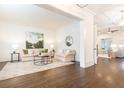 Bright living room with hardwood floors, neutral decor, and ample natural light at 765 Glengate Pl, Atlanta, GA 30328