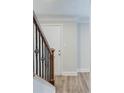 Hallway with wood-look flooring and classic trim at 2340 Beaver Ruin Rd # Un62, Norcross, GA 30071