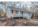 Cozy single-story house with a classic architectural design and a welcoming front entrance at 112 Oakland Blvd, Stockbridge, GA 30281