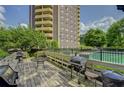 Outdoor deck with pool and multiple stainless steel grilling stations with counter space at 1501 Clairmont Rd # 1318, Decatur, GA 30033