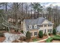 Well-maintained two-story home featuring a spacious yard and meticulously kept landscaping at 12090 Lonsdale Ln, Roswell, GA 30075