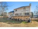 Expansive backyard with wooden deck area perfect for entertaining or relaxing outdoors at 4550 Wenden Ln, Marietta, GA 30062