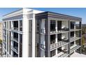 Luxury high-rise with multiple balconies and outdoor grills for entertaining at 2425 Peachtree Rd # 1806, Atlanta, GA 30305