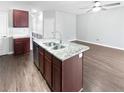 Modern kitchen with stainless steel appliances and granite countertops at 3194 Haynes Park Dr, Lithonia, GA 30038