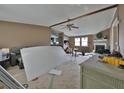 Bright living room featuring a fireplace, ceiling fan, and ample space for customization at 1010 Martin Ln, Canton, GA 30114