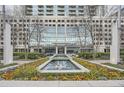 Beautiful building entrance with water feature and manicured landscaping at 3324 Peachtree Ne Rd # 2118, Atlanta, GA 30326