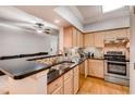 Bright kitchen featuring stainless steel appliances, mosaic backsplash, bar seating and modern countertops at 3777 Peachtree Ne Rd # 1324, Brookhaven, GA 30319