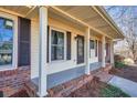 Covered front porch featuring classic columns and a brick base at 2826 Summit Ridge Dr, Marietta, GA 30066