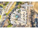 Aerial view of a complex with a pool, gym, parking, and proximity to the Atlanta Beltline Eastside Trail at 821 Ralph Mcgill Ne Blvd # 3104, Atlanta, GA 30306