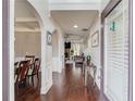 Elegant foyer with hardwood floors, arched doorways, and views into the living spaces at 1217 Trophy Club Ave, Dacula, GA 30019