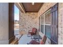 Cozy front porch with comfortable seating, perfect for enjoying quiet moments outdoors at 1217 Trophy Club Ave, Dacula, GA 30019