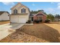 Charming two-story home with a two car garage and well-maintained front yard at 2928 Lakewater Way, Snellville, GA 30039