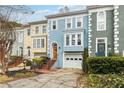 Inviting townhome exterior highlighting colorful facades, attached garages, and meticulous landscaping at 3783 Meeting St, Duluth, GA 30096