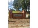 Windy Gate brick sign at the entrance of the neighborhood at 5768 Windgate Lane Ln, Lithonia, GA 30058