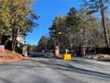 Secured community entrance with brick pillars and a black metal gate at 300 Johnson Ferry Ne Rd # B401, Atlanta, GA 30328