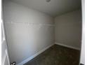 Spacious walk-in closet with shelving for ample storage at 5021 Falcon Pt, Douglasville, GA 30135