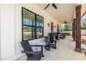 Relaxing front porch featuring comfortable seating, elegant columns, and a serene ambiance at 1751 Stanwood Se Ave, Atlanta, GA 30317