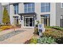 Inviting leasing office entrance with well-maintained landscaping and signage at 747 Ralph Mcgill Ne Blvd # 326, Atlanta, GA 30312