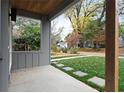 Inviting front porch with stone pathway, offering a peaceful view of the neighborhood at 1186A Francis Nw St, Atlanta, GA 30318