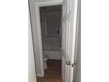 Small bathroom featuring a toilet, tub, shower, and sink at 2305 Phillips Rd, Lithonia, GA 30058