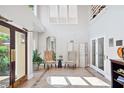 Bright, neutral lobby featuring tile floors, high ceilings, and comfortable seating with natural light at 5306 Brooke Ridge Dr, Atlanta, GA 30338
