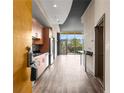 Bright kitchen featuring stainless steel appliances, light wood cabinets, and modern finishes with an open floor plan at 3400 Malone Dr # 303, Atlanta, GA 30341