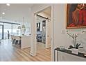 Hallway with modern finishes leads to the kitchen at 788 W Marietta Nw St # 913, Atlanta, GA 30318