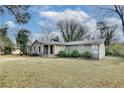 Single-story home featuring mature landscaping and a well-maintained yard at 2312 Wayside Ne Dr, Brookhaven, GA 30319