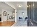 Light-filled foyer featuring tile floors, seating area, and access to living spaces at 2312 Wayside Ne Dr, Brookhaven, GA 30319