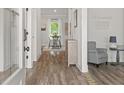 Inviting home foyer with hardwood floors and warm, neutral paint colors at 4433 Eastbrook Pl, Snellville, GA 30039