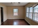 Bright bedroom featuring hardwood floors, and multiple windows that let in natural light at 1210 Beech St, Marietta, GA 30062