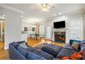 Open living space featuring a fireplace, hardwood floors, and view of the dining area at 1363 Summer Lane Se Dr, Atlanta, GA 30316