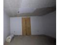 Unfinished bedroom with drywall and a covered window at 884 Mcdaniel Sw St, Atlanta, GA 30310