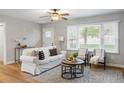 Cozy living room with neutral walls, stylish furniture, bright natural light, and modern decor at 2485 Brentwood Rd, Decatur, GA 30032