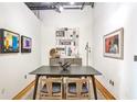 Modern dining room with stylish table, contemporary art, and unique decor at 3235 Roswell Ne Rd # 919, Atlanta, GA 30305