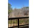 Scenic wooded view from the wooden deck at 201 Retreat Ln, Canton, GA 30114