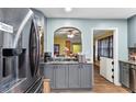 Open kitchen layout with stainless steel appliances and modern cabinets at 270 Cochran Ridge Rd, Dallas, GA 30157