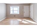 Inviting living room with a bay window, natural light, and closet at 2958 Flat Shoals Rd, Decatur, GA 30034