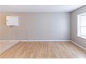 A spacious living room area with hardwood floors and lots of natural light at 2958 Flat Shoals Rd, Decatur, GA 30034