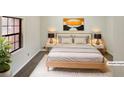 Cozy bedroom with ample natural light and stylish decor at 180 Antebellum Way, Fayetteville, GA 30215