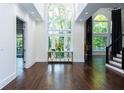 Bright foyer features hardwood floors and a soaring window at 3258 Bransley Way, Duluth, GA 30097