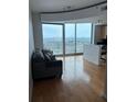 Spacious living room featuring a large window and city views at 361 17Th Nw St # 2308, Atlanta, GA 30363